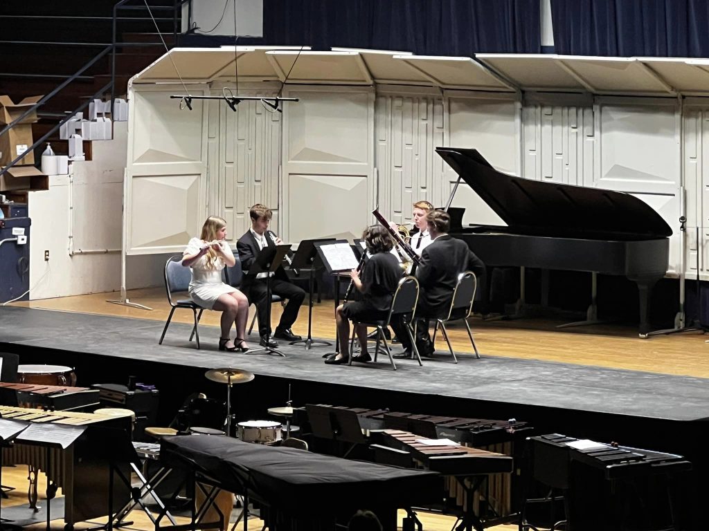 a wind ensemble performs during the red lodge music festival